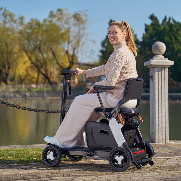 Trottinette électrique pliable à quatre roues et télécommande, légère