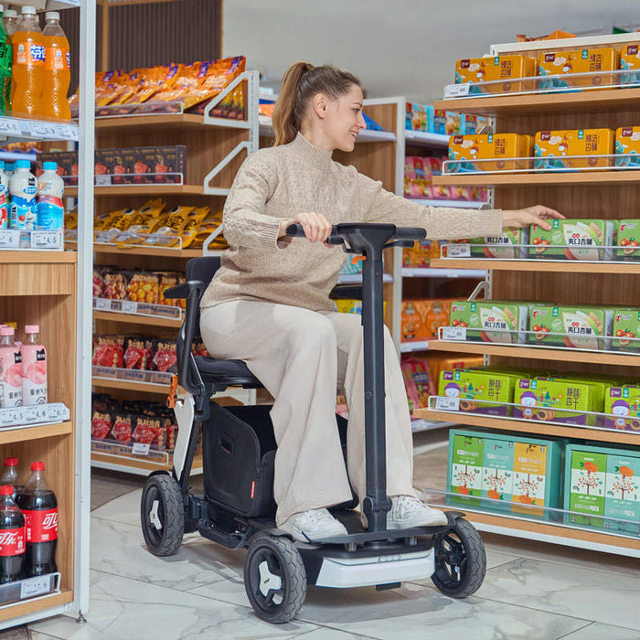 Trottinette électrique pliable à quatre roues et télécommande, légère